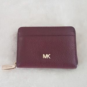 Michael Kors
Pebbled Leather Zip Around Wallet